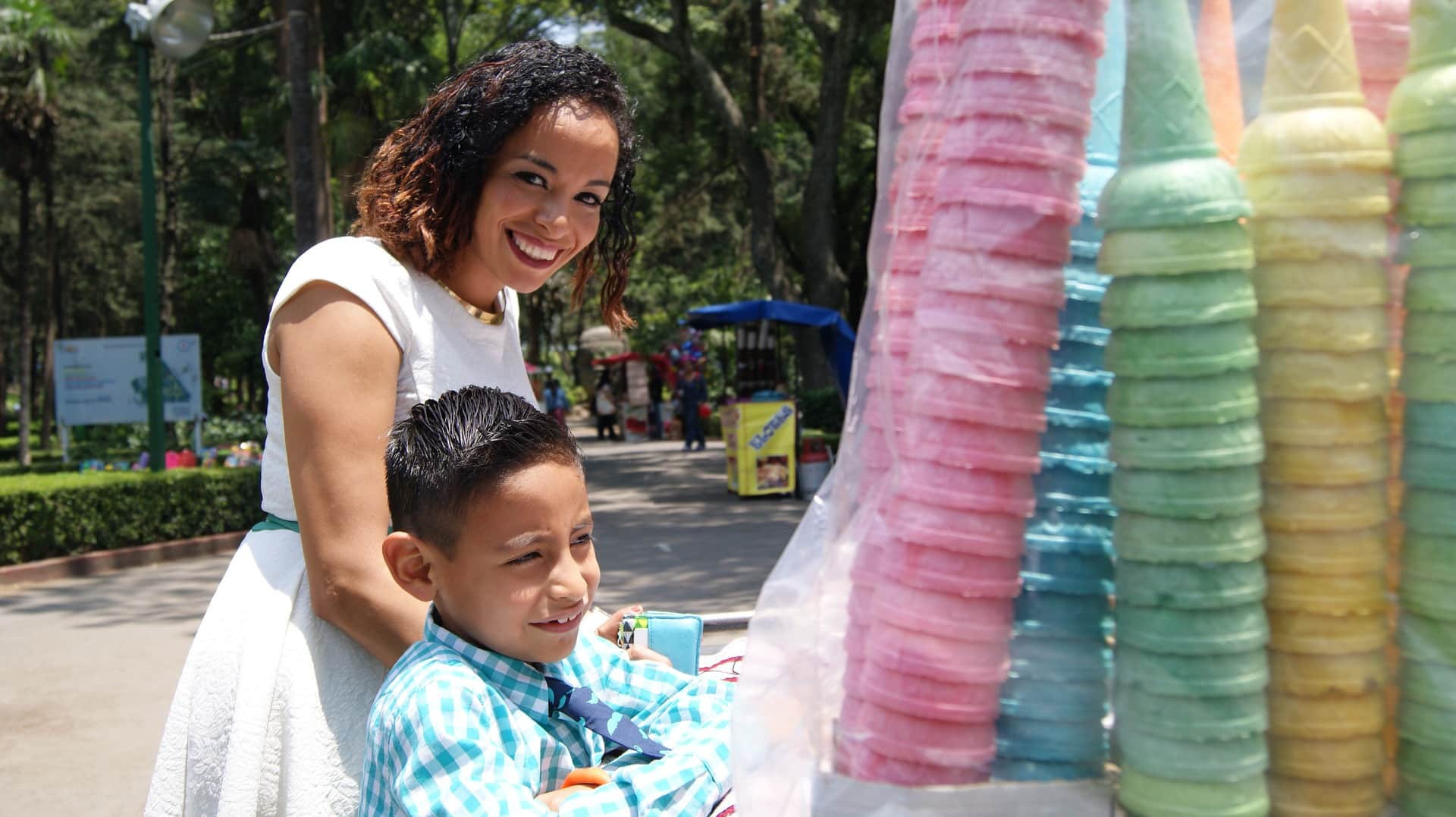 send money to elektra to families like this one in mexico in the park with ice cream cones
