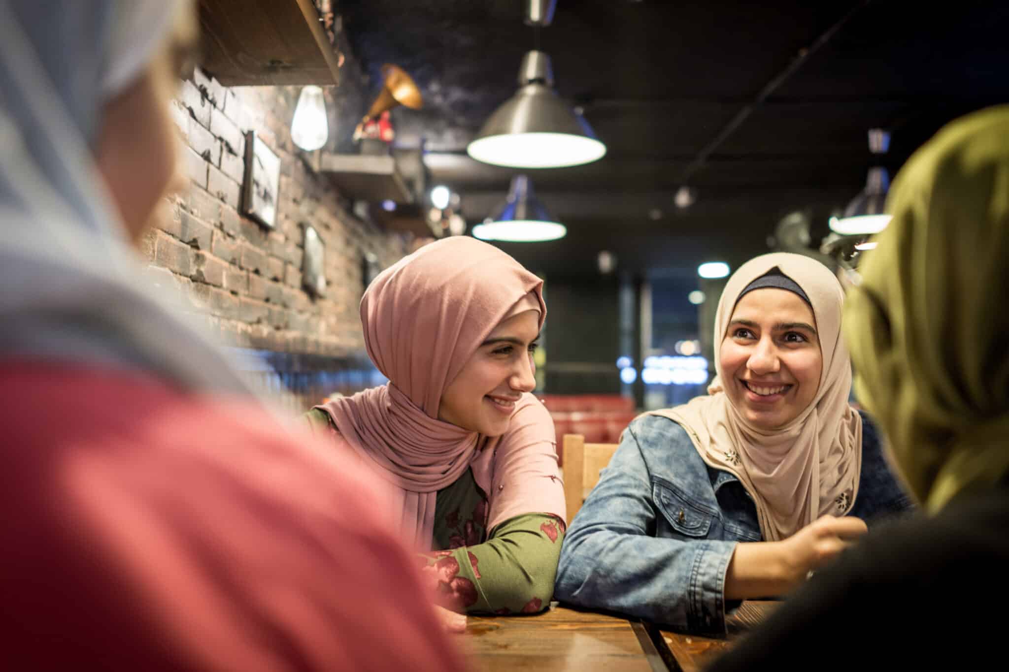 Muslim Arab teenage girls celebrating together perhaps during Eid