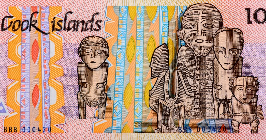 Cook Islands money featuring traditional statues in beautiful world currency design