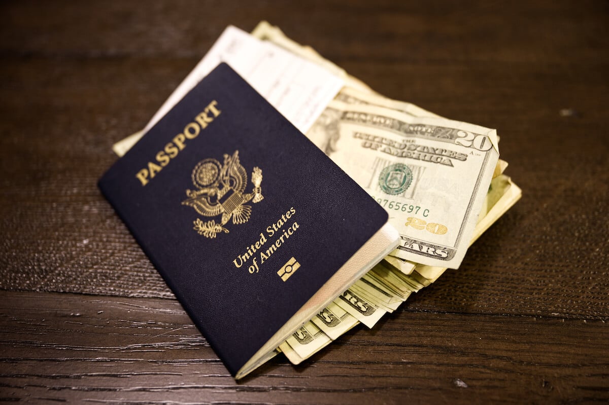 United States of America passport and some bills