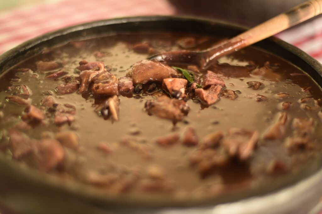 feijoada stew with a spoon in it