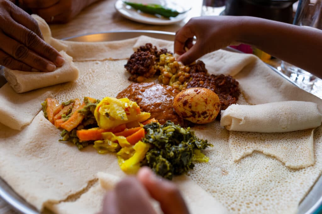 injera bread with various toppings