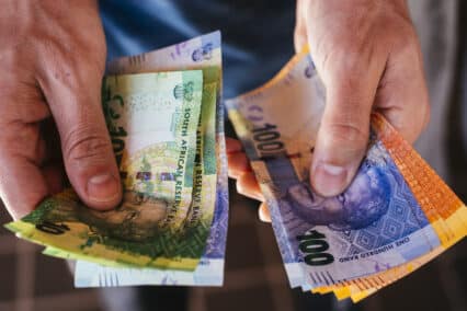 A collection of mixed denomination South African rand banknotes sit in an arranged photo in Johannesburg, South Africa. Photographer: Waldo Swiegers/Bloomberg