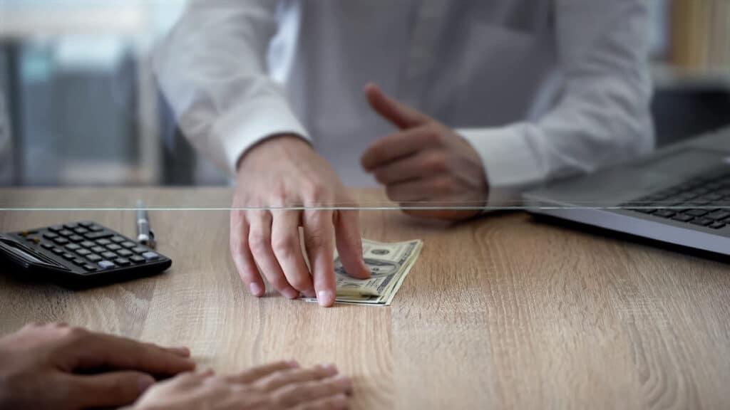 clerk receiving money