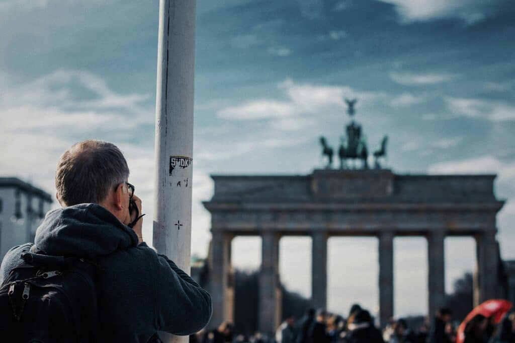 Person taking picture of Bradenburg Gate