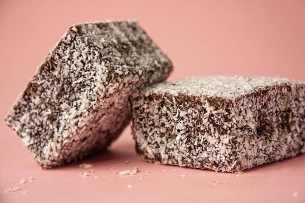 Lamingtons are sweet treats covered in coconut on this list of top Australian dishes