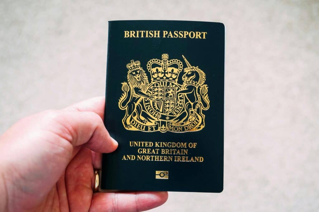 photo of hand holding a british passport